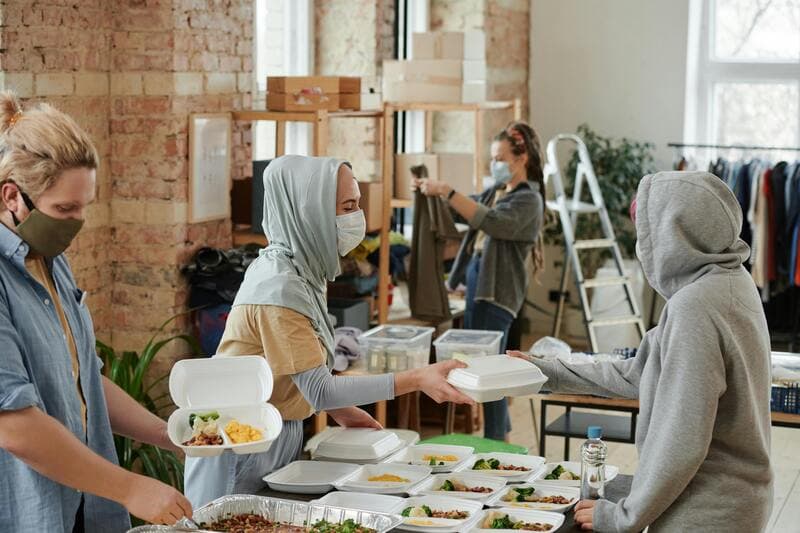 Volunteers handing out food