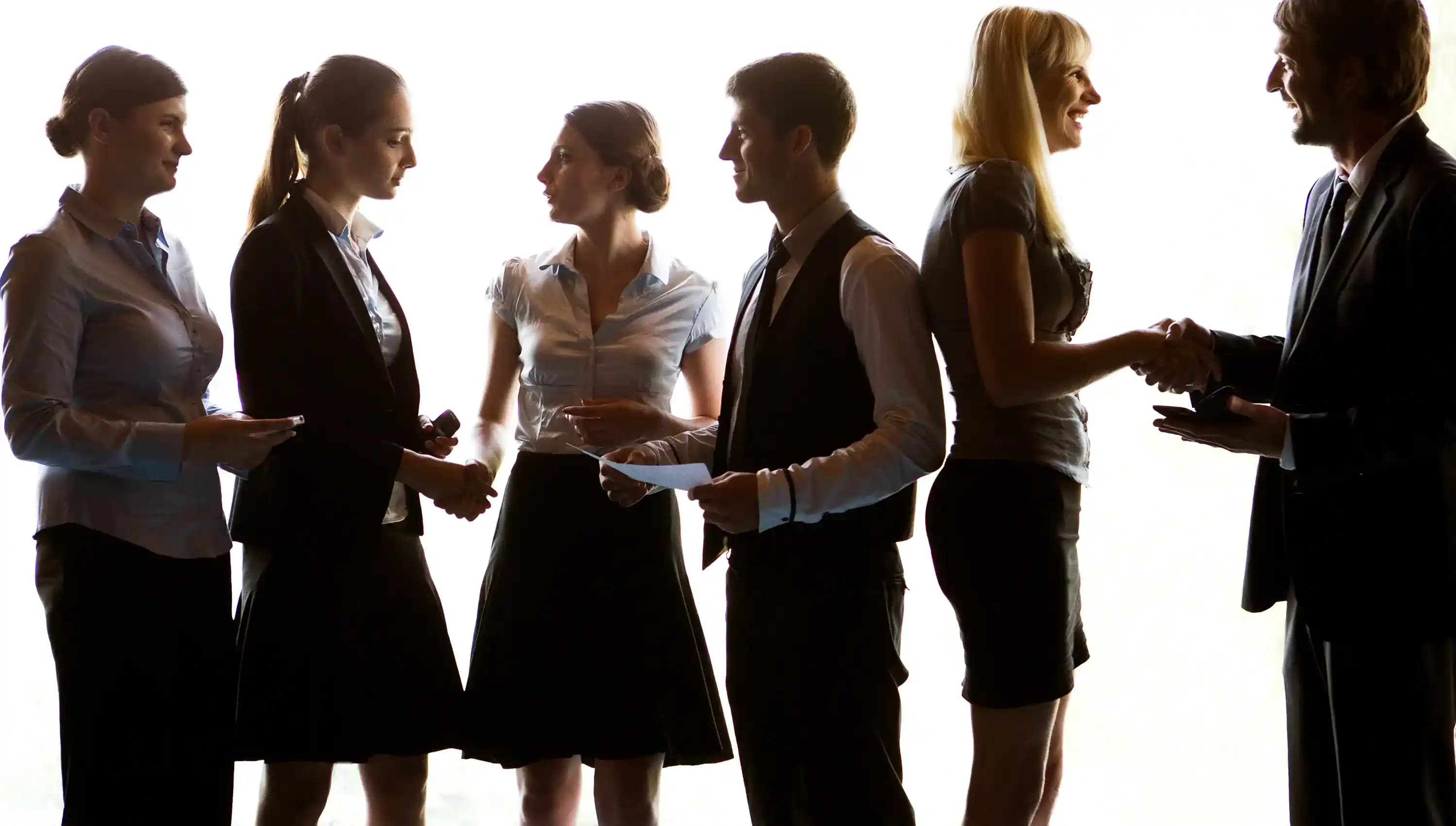 Multiple business professionals interacting and connecting.